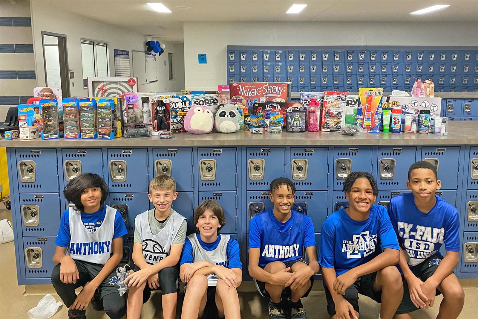 Anthony Middle School boys athletics participates in CALI BEAR toy drive.
